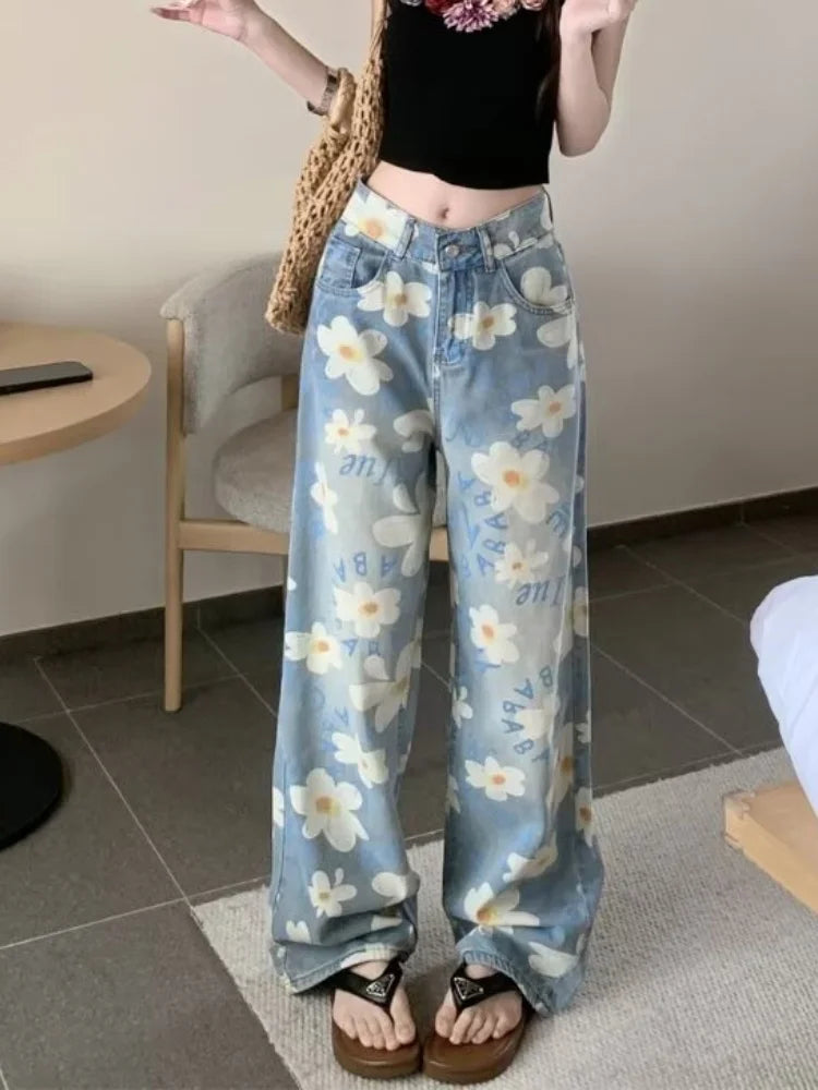 Floral wide leg jeans indoors with black crop top