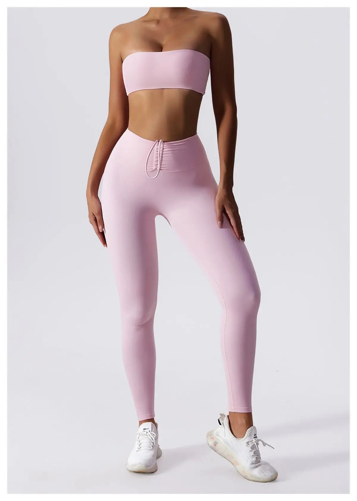 Pink bandeau bra and legging set, full length front view