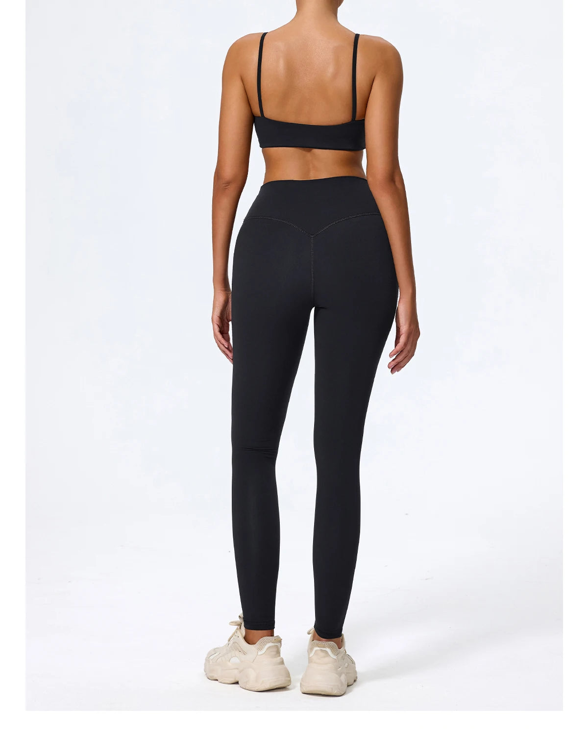 Black biker shorts back view showing the high waistband and centre seam