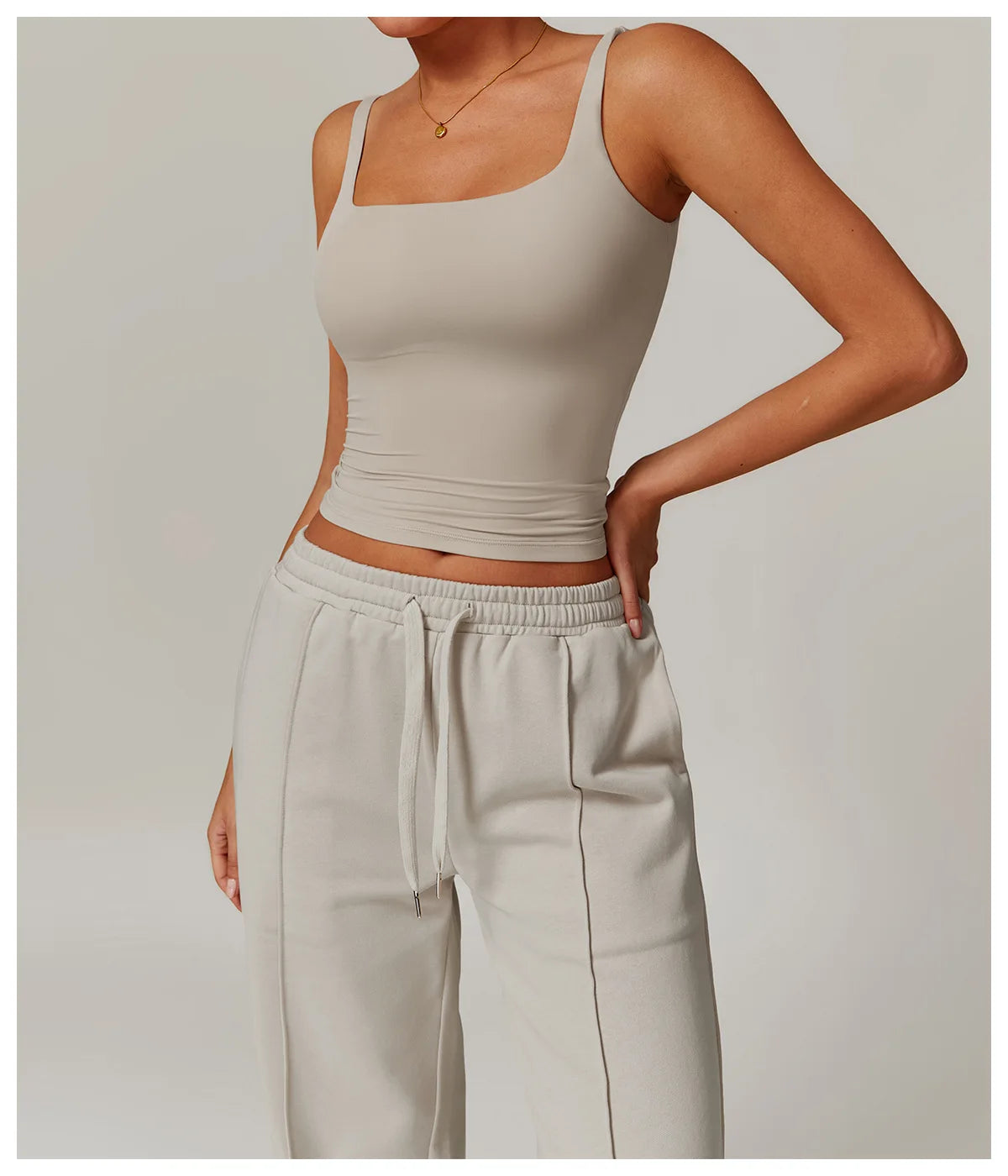 Khaki fitted tank top, three quarter view on model