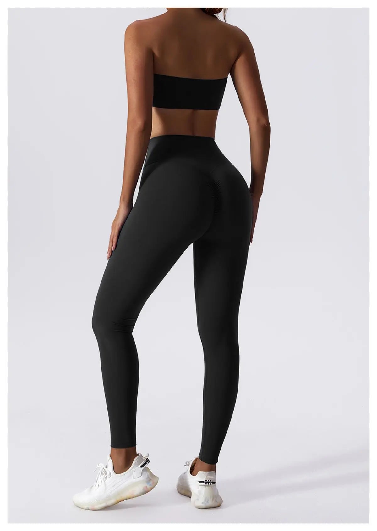 Black bandeau bra, full length back view with leggings