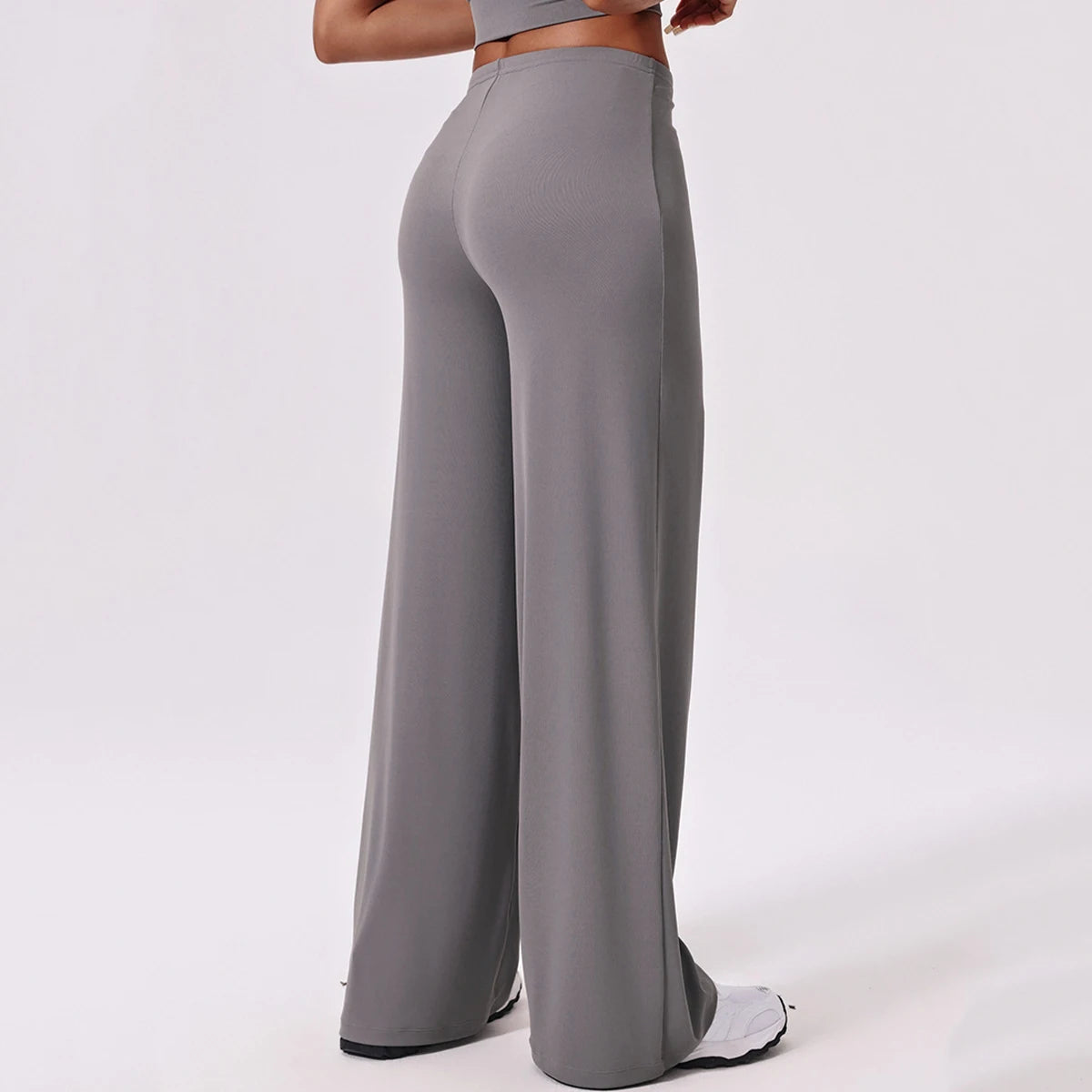 Grey wide leg yoga pants back view showing the seat and leg line
