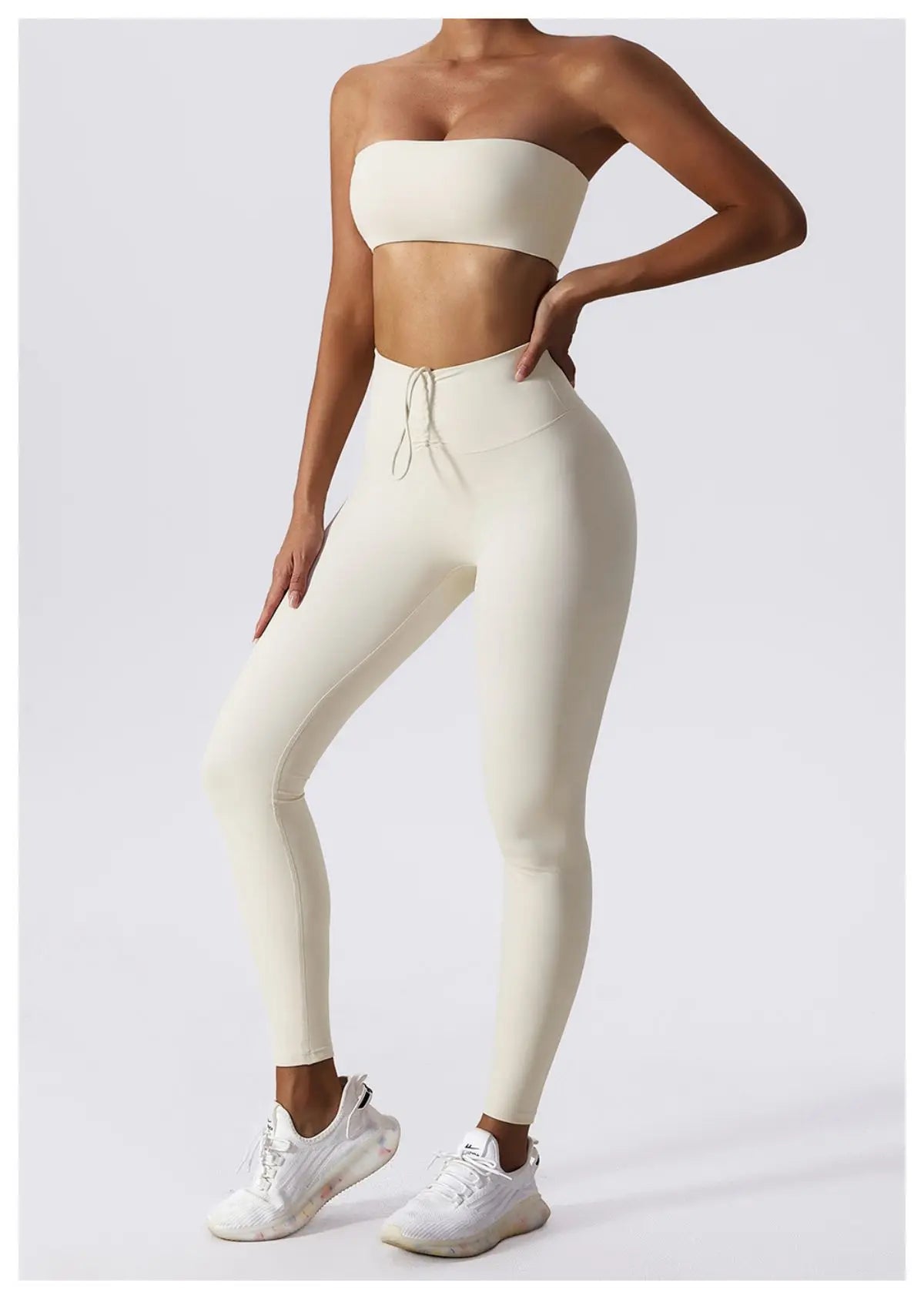Ivory bandeau bra with leggings, three-quarter view