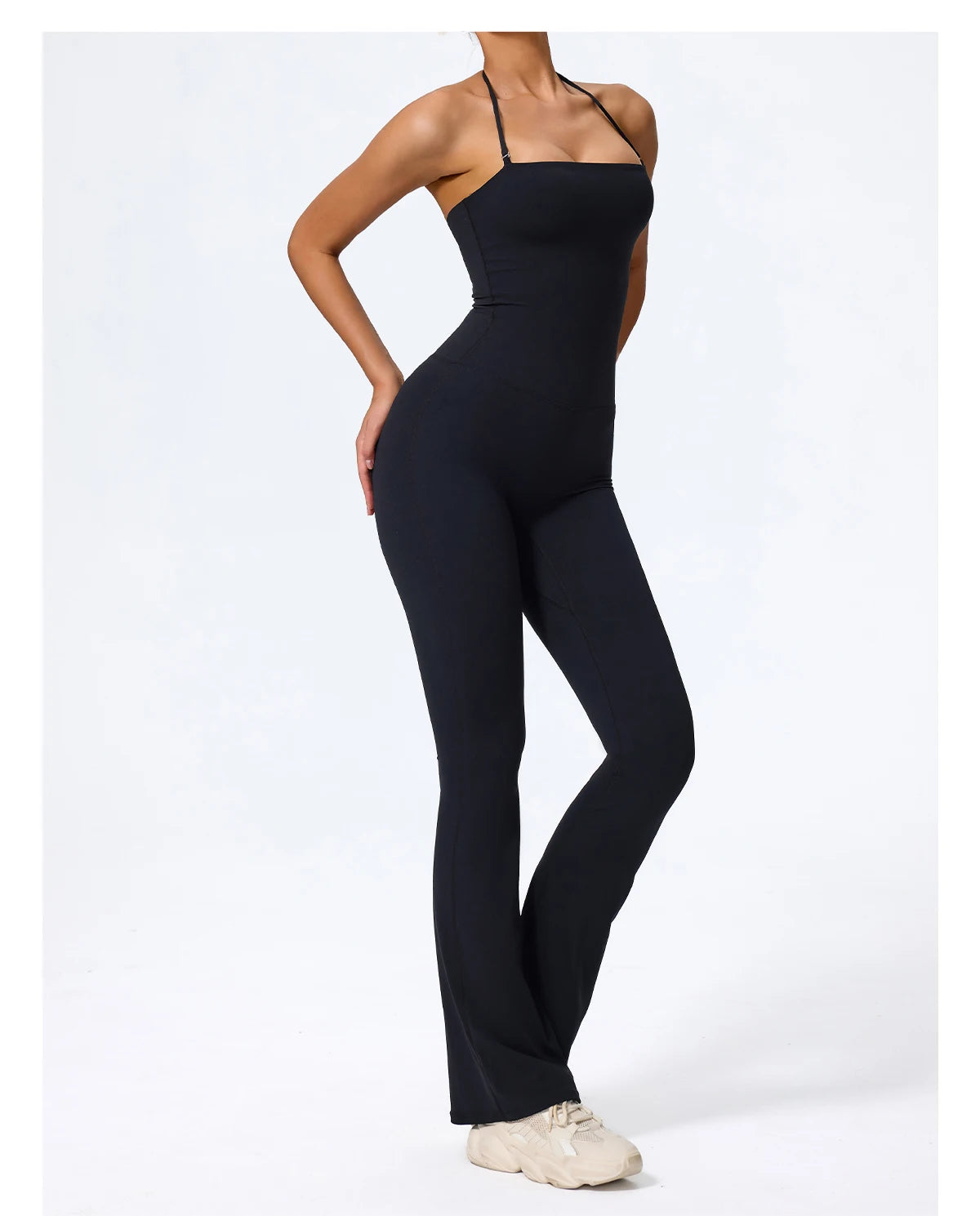 Casual jumpsuit for women in black, three-quarter view showing the fitted hip