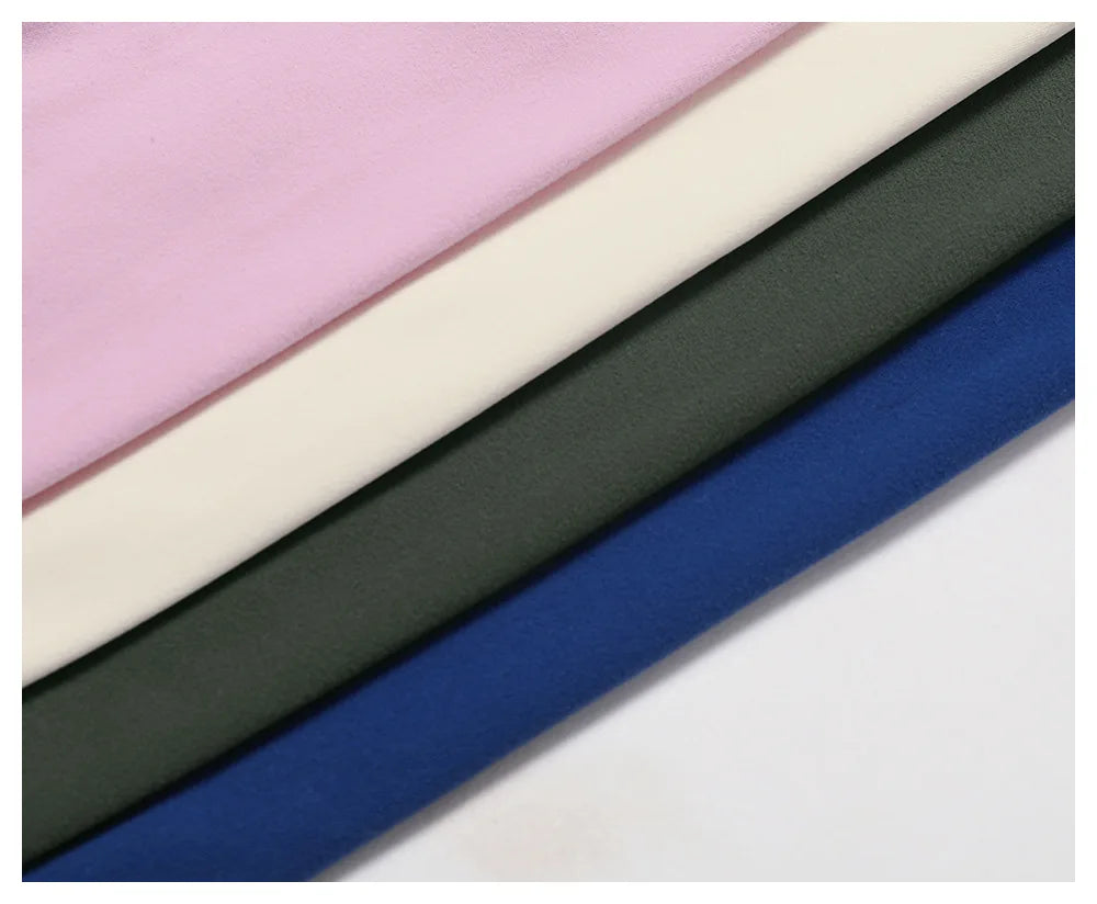 Four bandeau bra colours stacked, pink ivory olive and blue