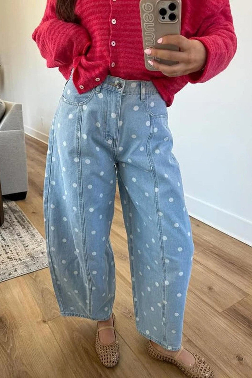 Light blue denim barrel jeans with white polka dots, curved leg tapering at the ankle