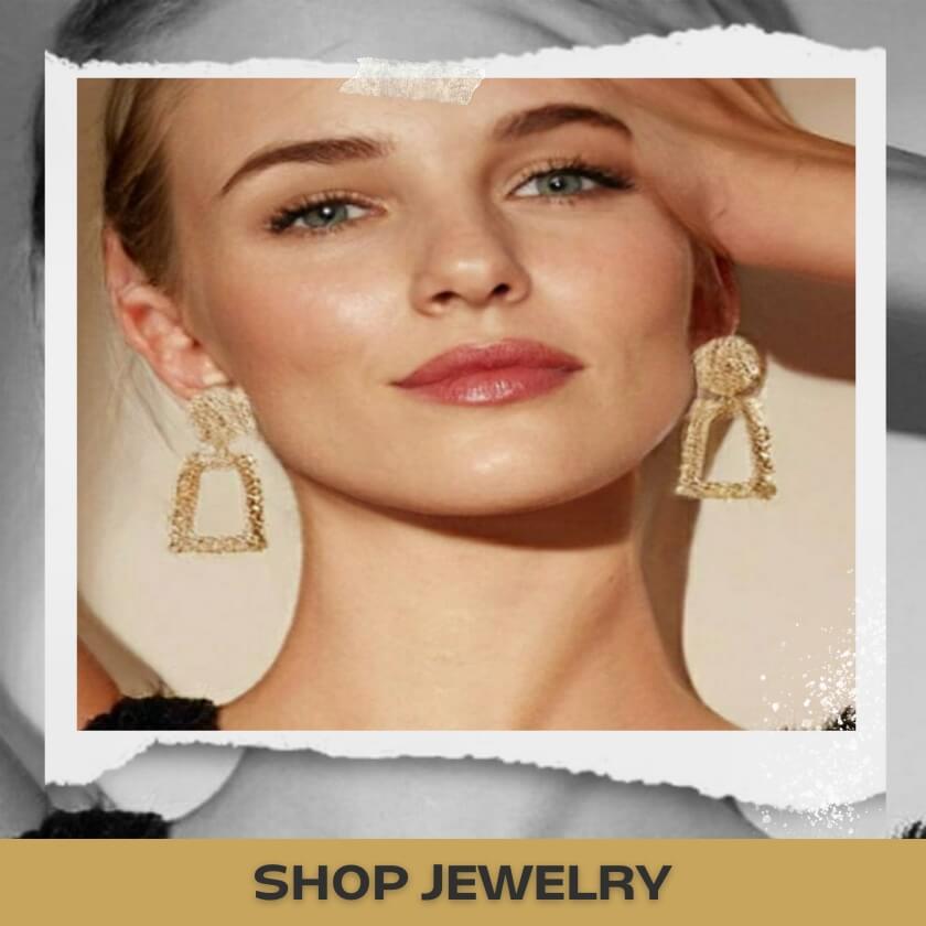 A photo of a women with gold earrings jewelry - shop jewelry - TGC Boutique