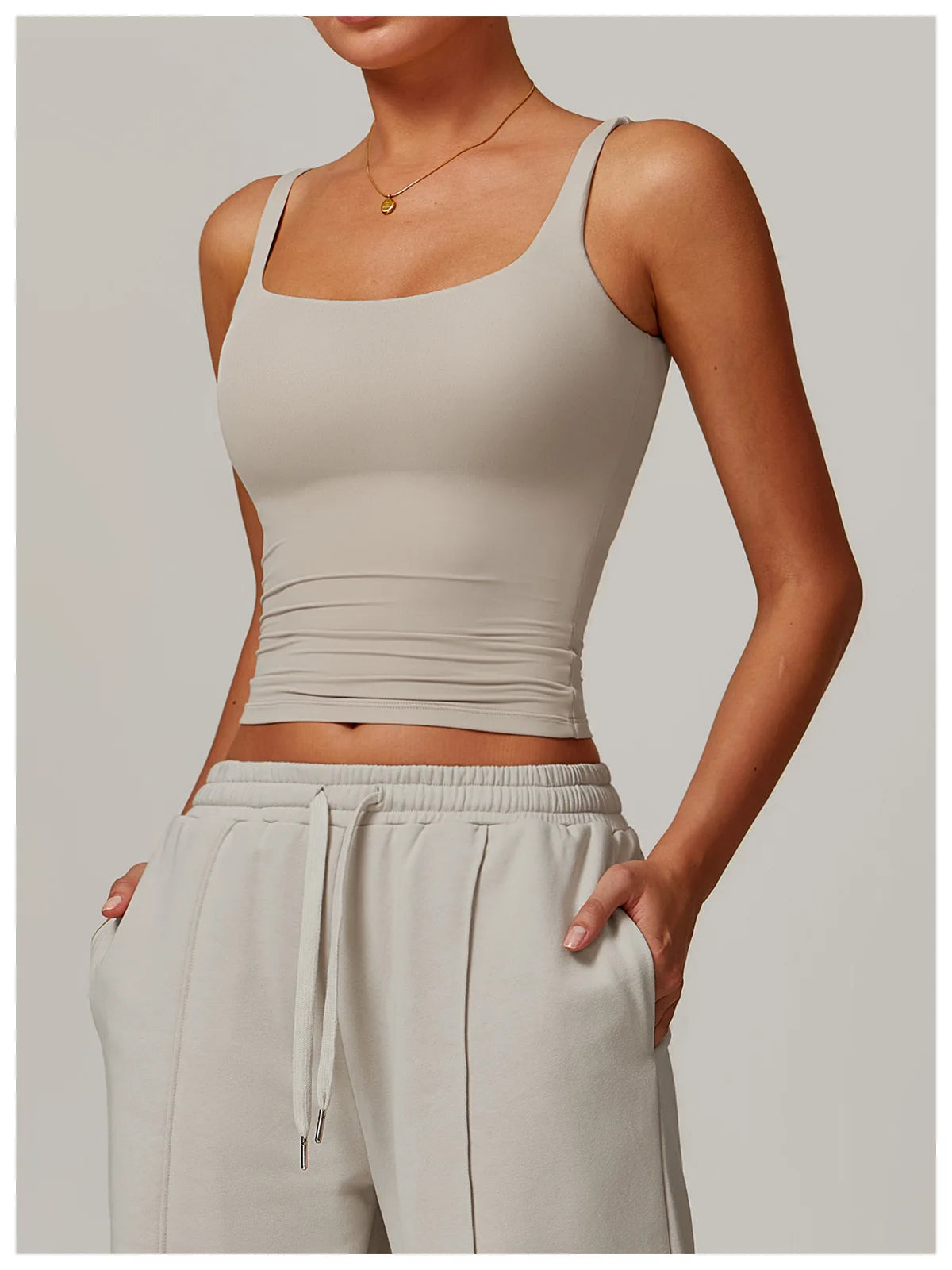 Khaki tank top back view showing the U shaped back