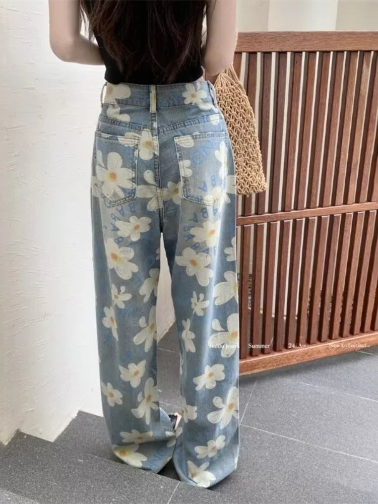 Floral jeans back view, daisy print over pockets and waistband