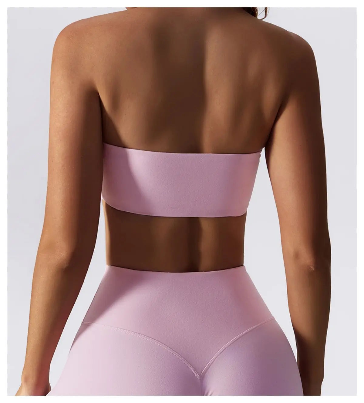 Pink bandeau bra rear view, smooth band with no hook or clasp