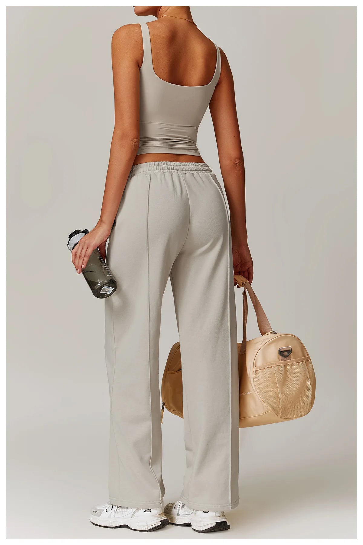 Khaki women workout tank top with trousers, side view