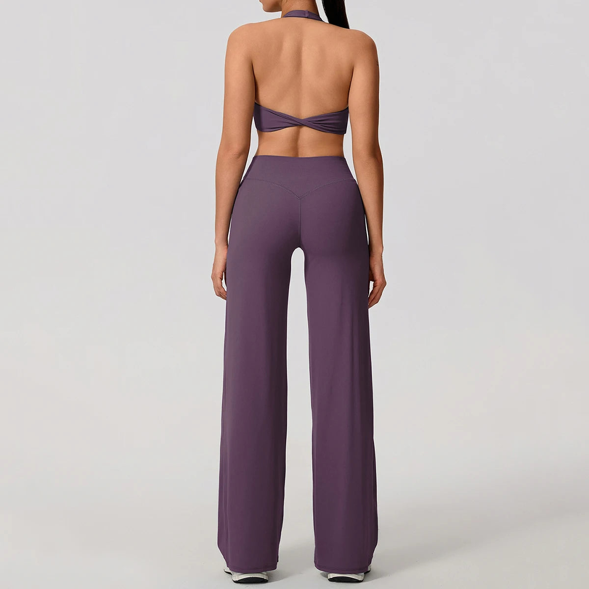 Workout sets for women in smoke purple, halter bra and wide leg trousers, back view