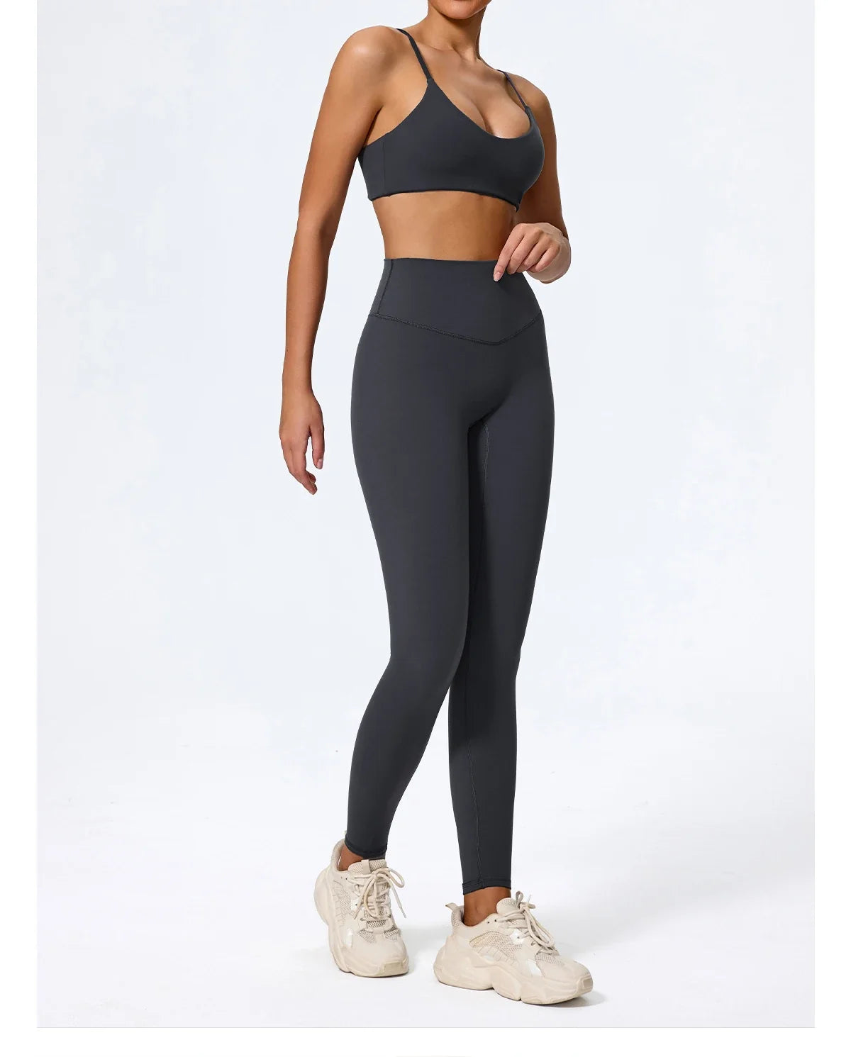 Navy blue high waisted leggings, three quarter view