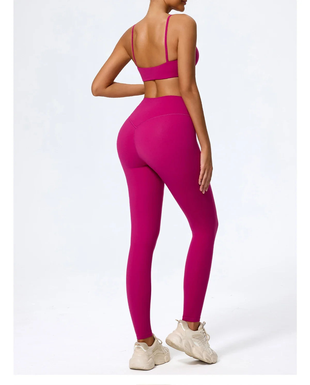Rose red leggings set back view showing the centre seam and wide waistband