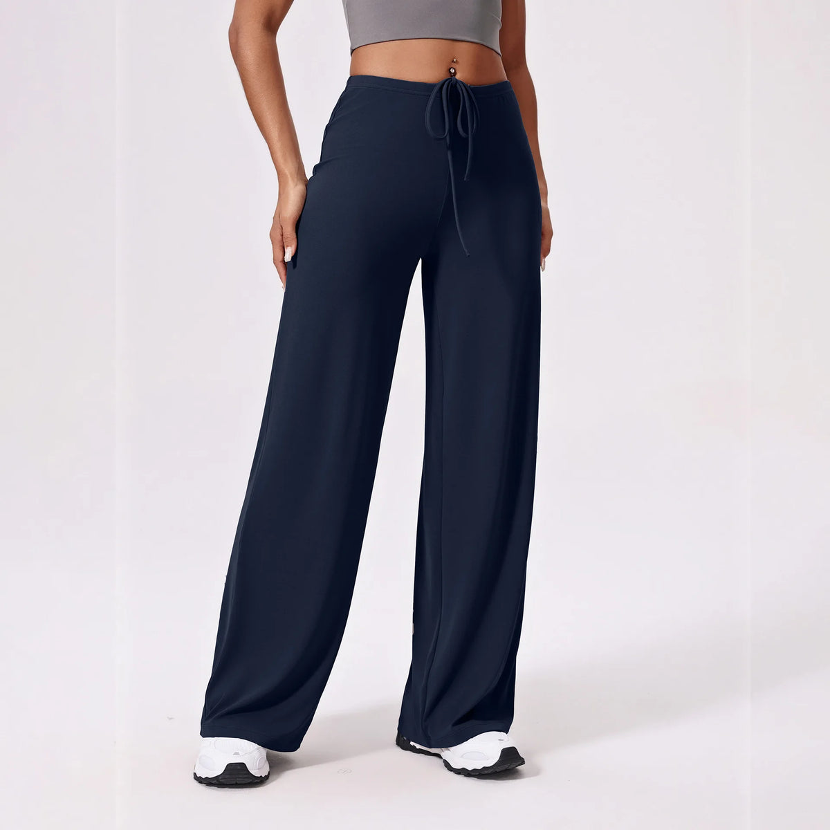 Navy blue yoga pants, full length front view on model
