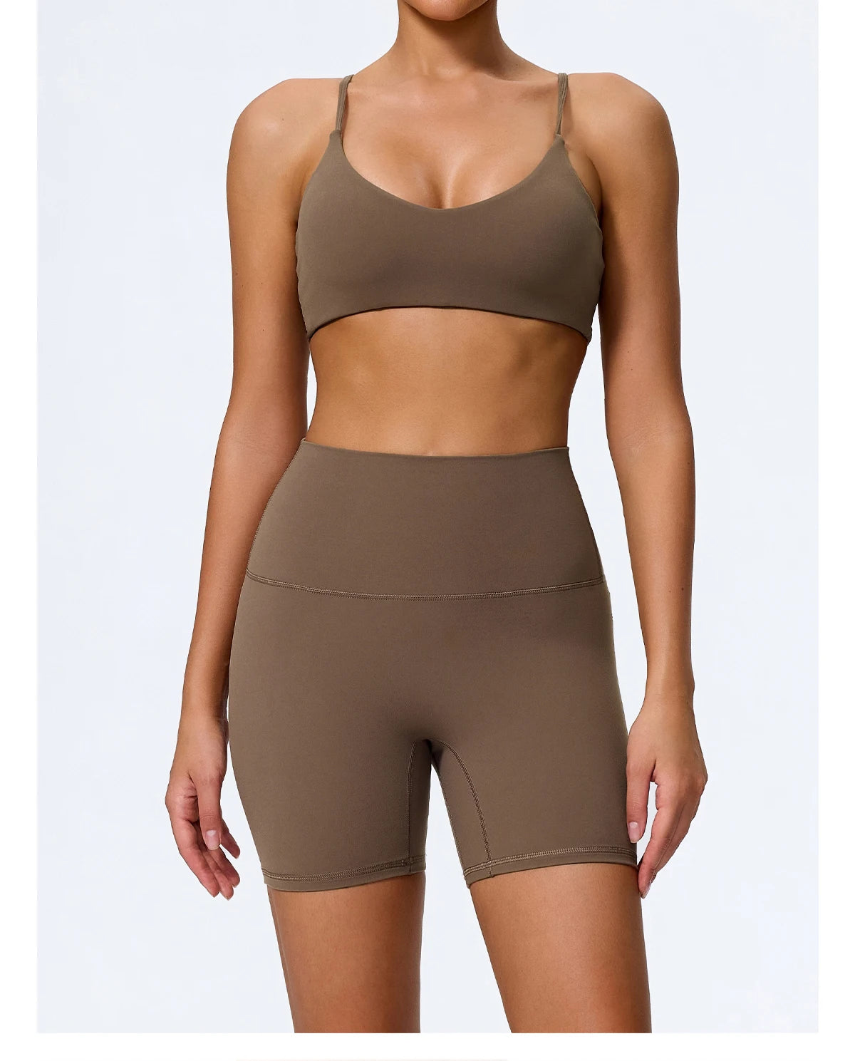 Caramel brown biker shorts women, front view with sports bra