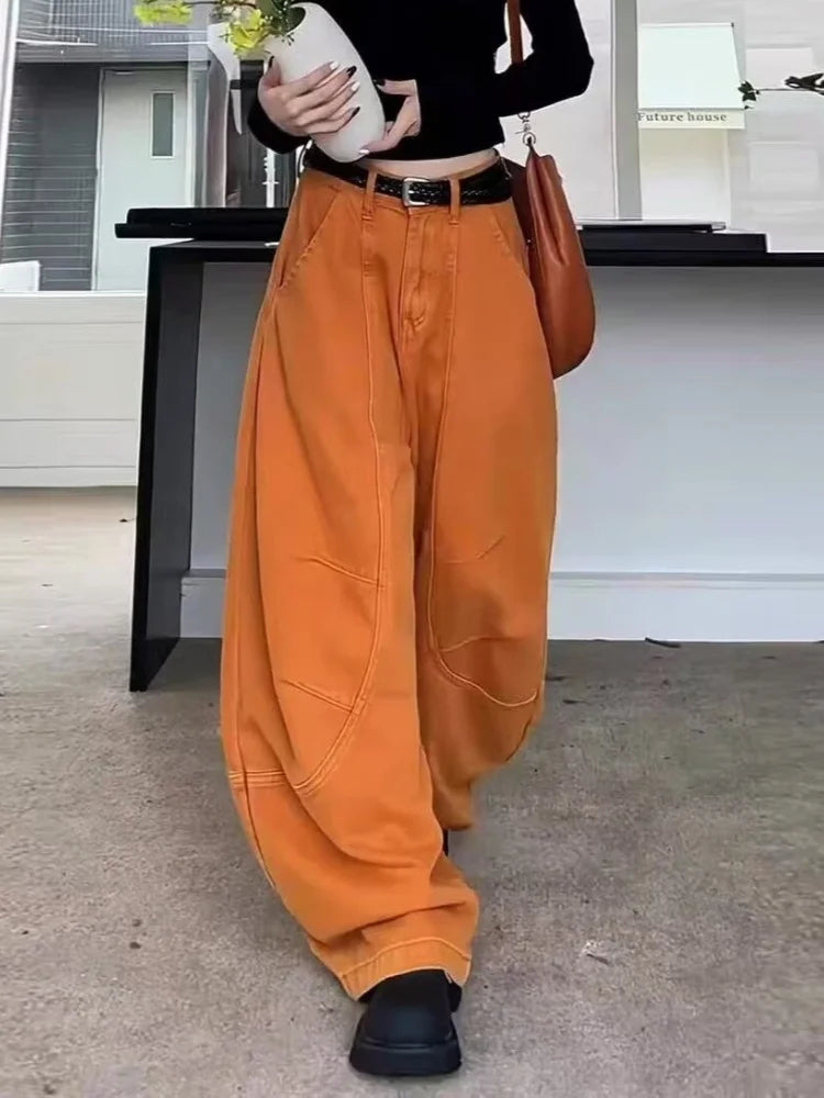 Women's orange baggy barrel pants, front, mid rise waist with belt