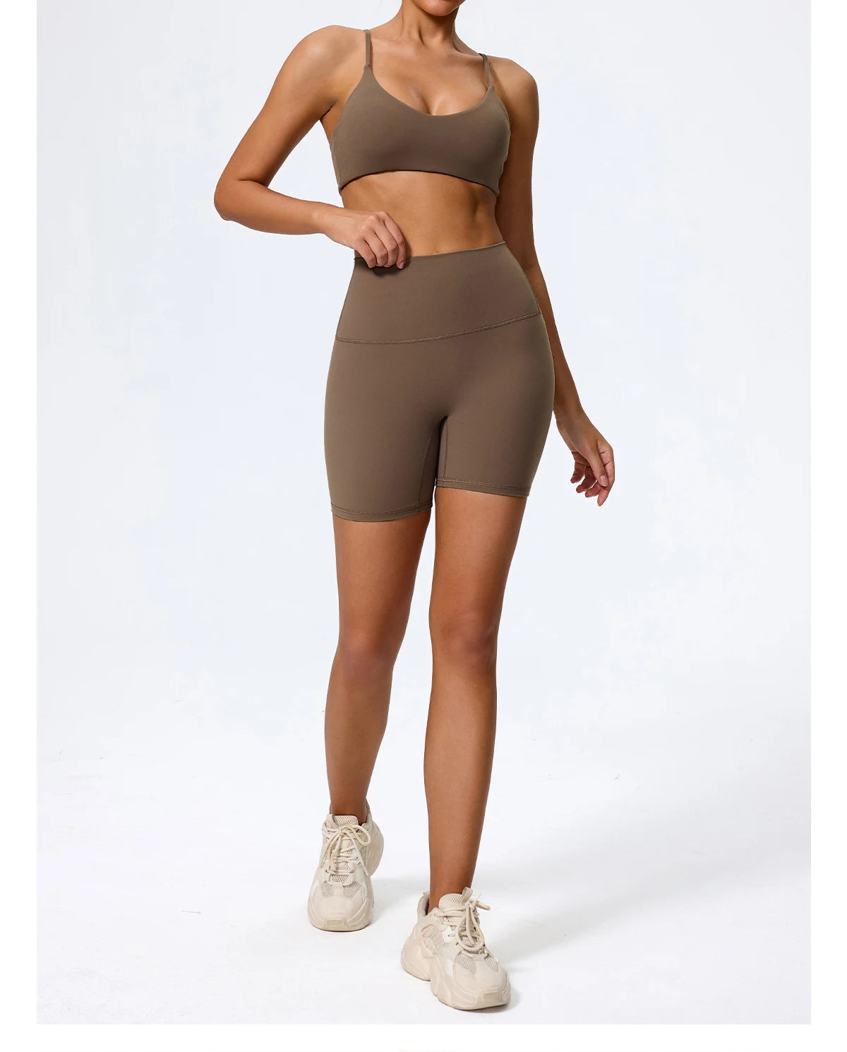 Caramel brown high waisted biker shorts, side view showing the mid thigh length