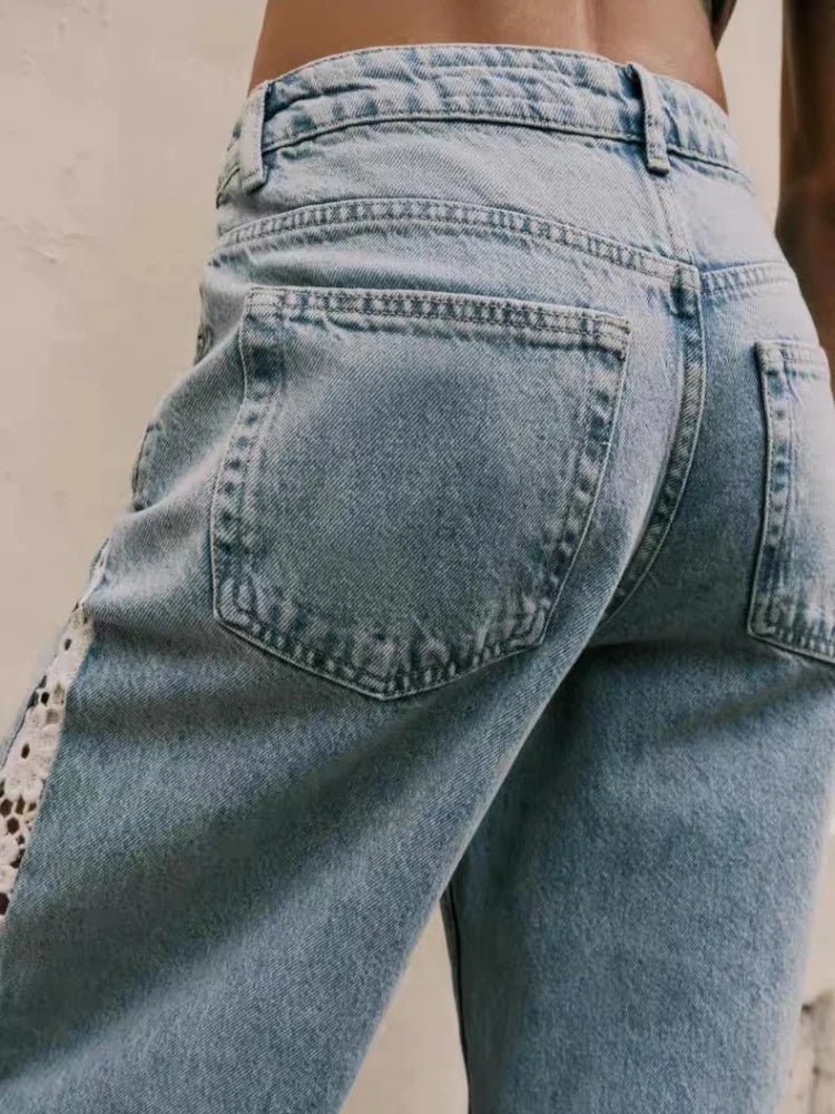 Back view of light wash jeans, mid rise waist and back pockets