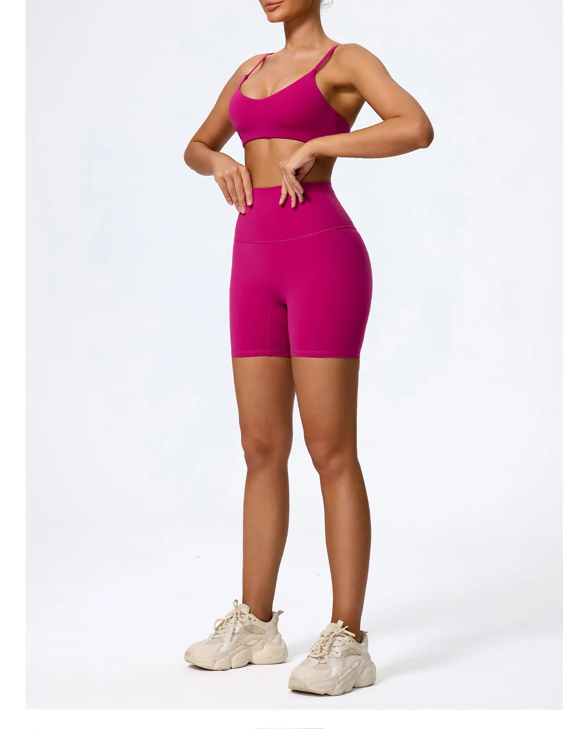 Sky blue biker shorts for women with matching sports bra, front view