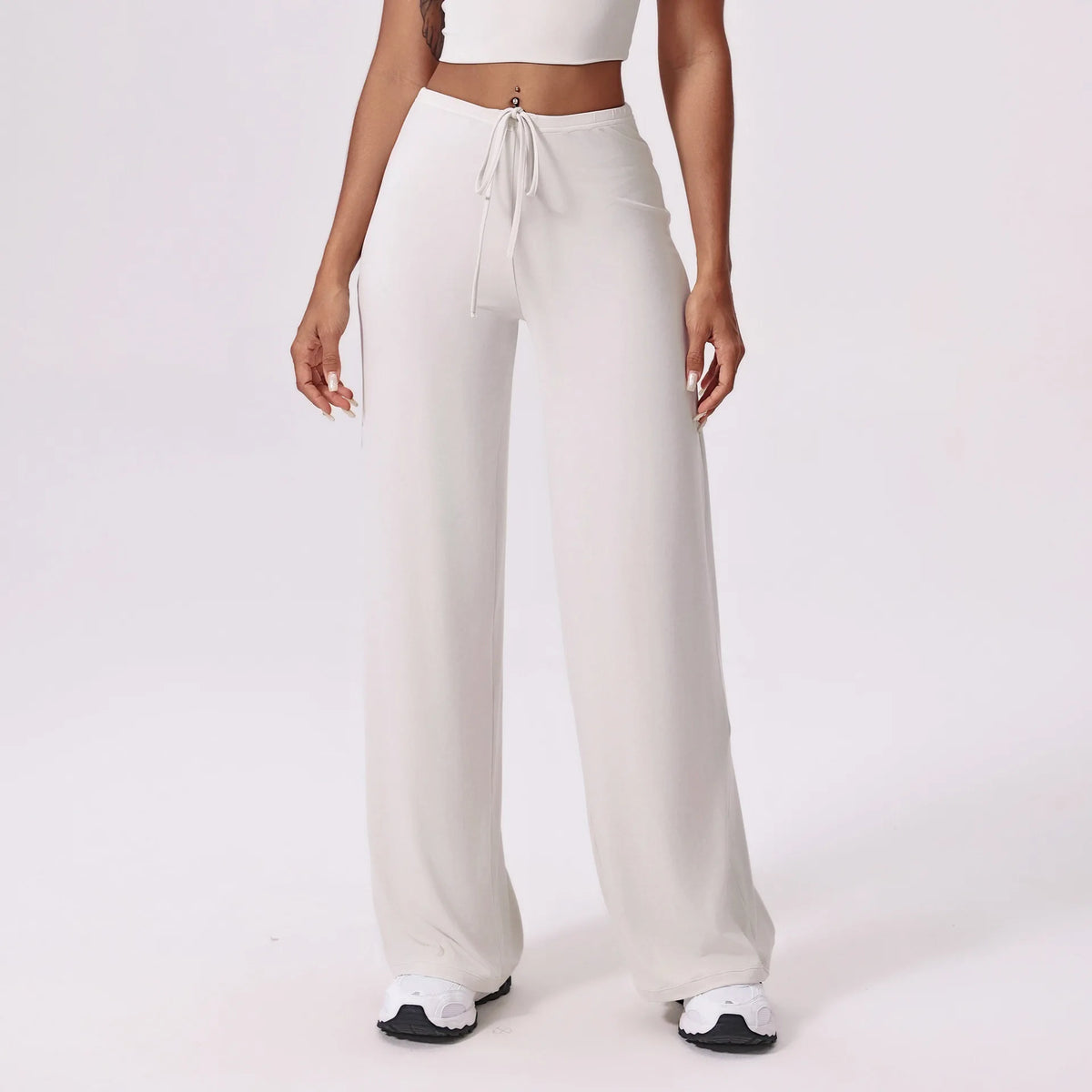 Wide leg yoga pants for women in white, front view with high waist and drawstring