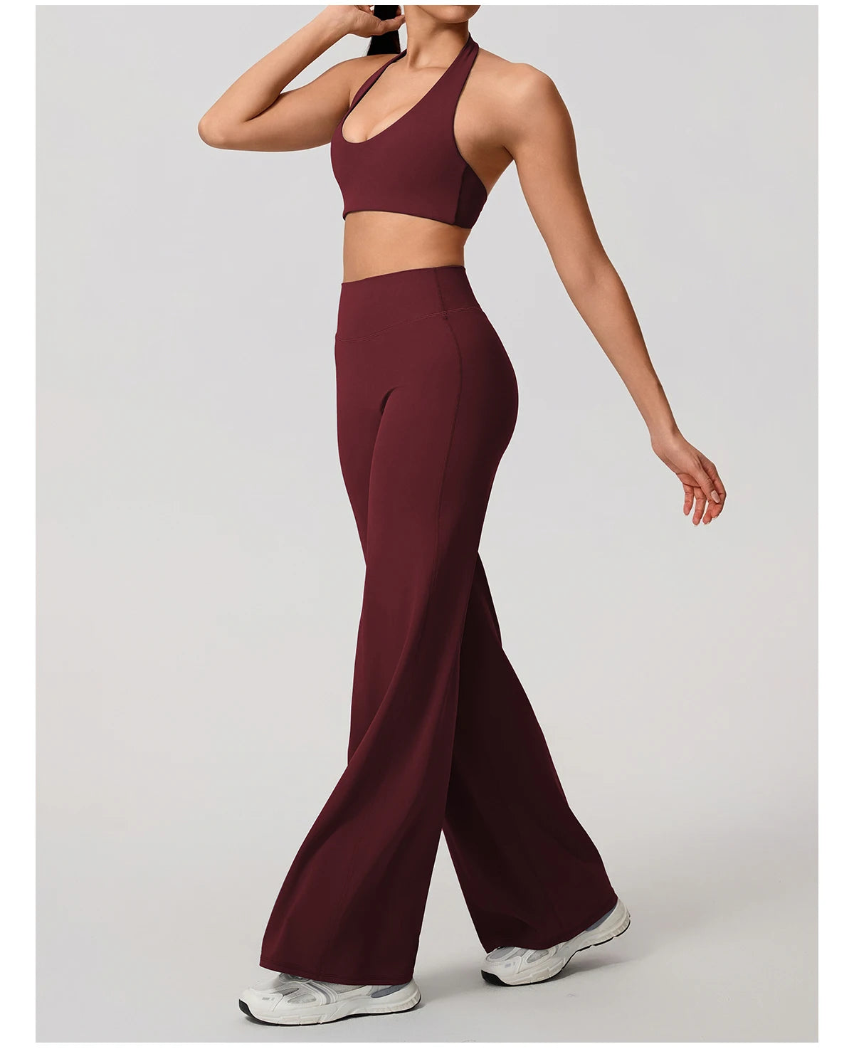 Red workout sets in rouge, halter bra and trousers front view
