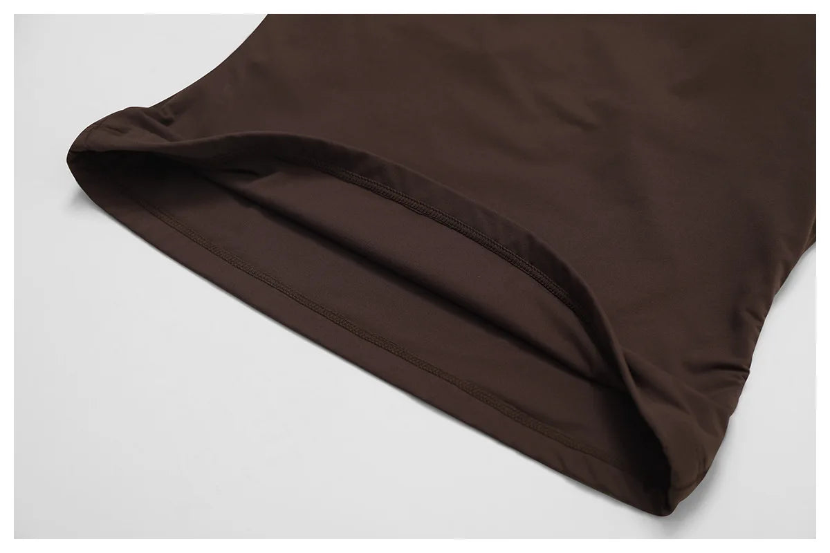 Ribbed tank top hem detail showing the fine rib knit