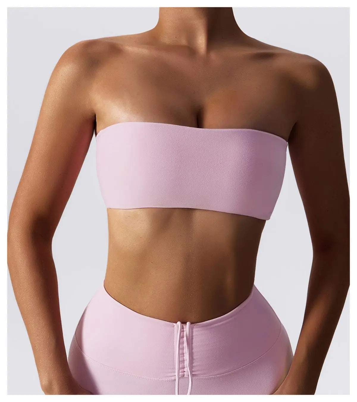 Padded strapless bra in pink, front view on model