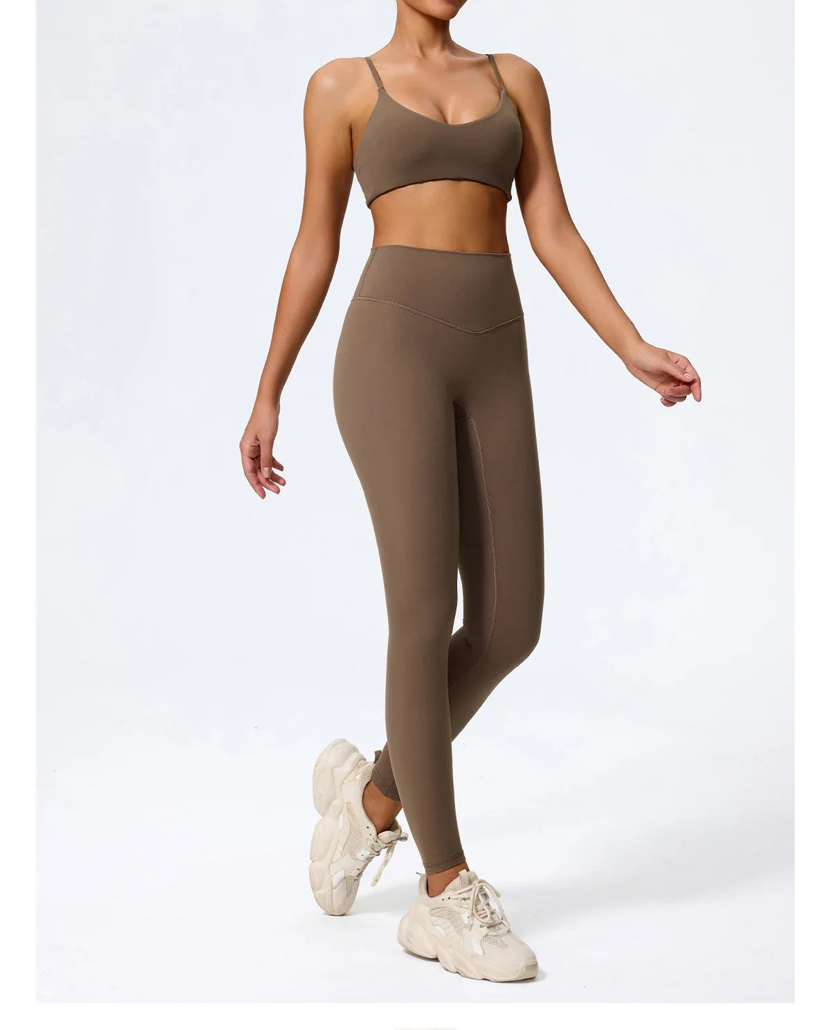 Caramel brown high waisted leggings with matching sports bra, side view