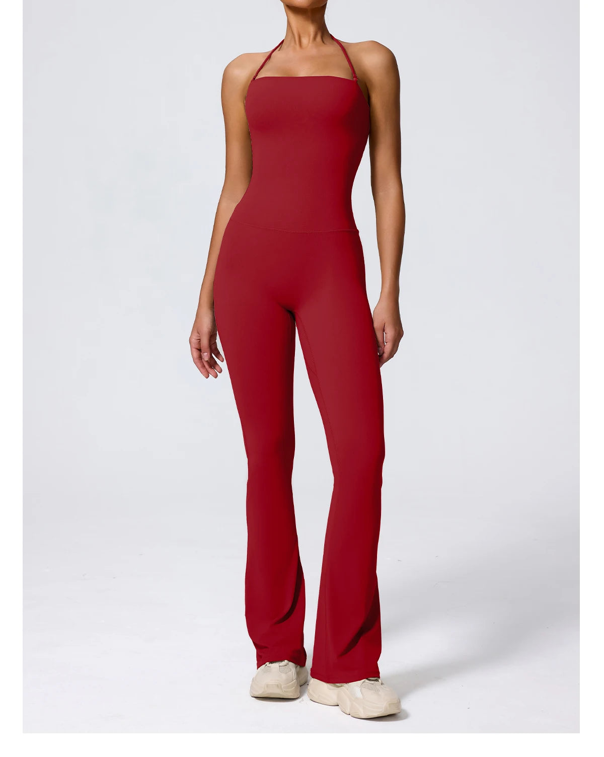Red jumpsuit front view, halter neck and wide flared leg