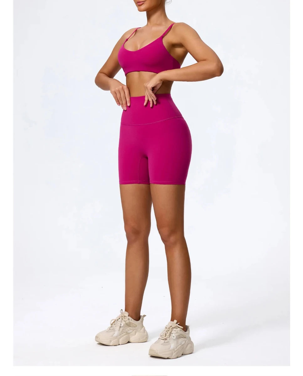 Rose red biker shorts set, side view, walking