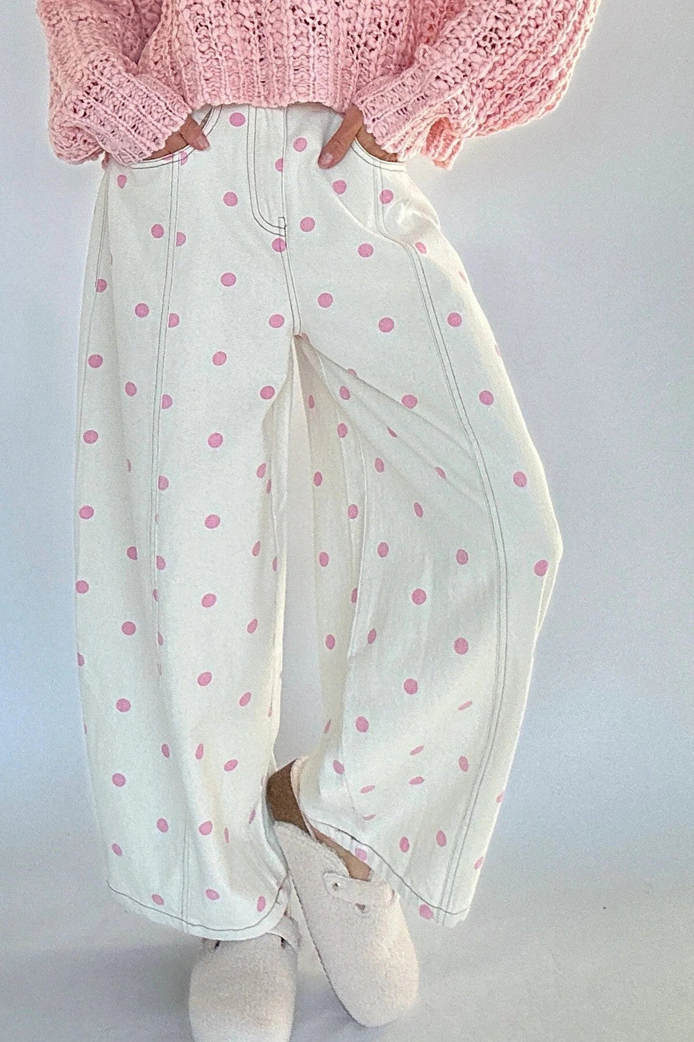 Beige polka dot barrel jeans shown full length from the front