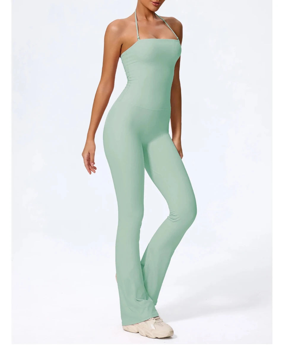 Sage green one piece jumpsuit, front, fitted through the hip