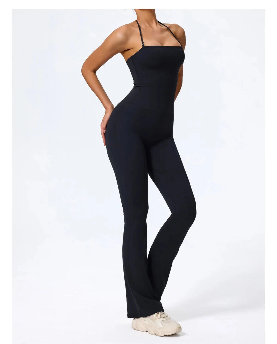 Black halter jumpsuit, three quarter front, flared leg to the floor