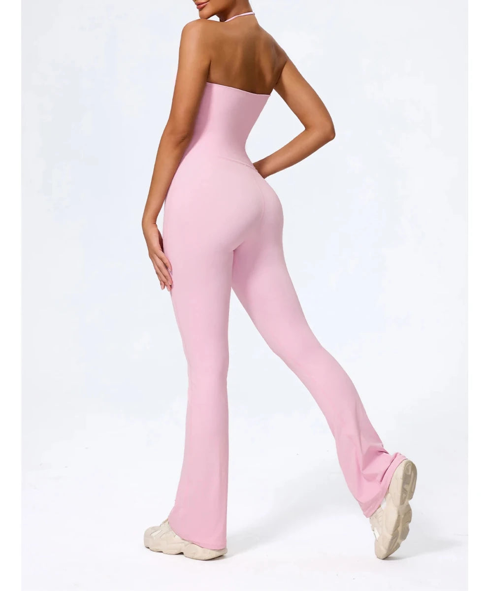 Pink flared jumpsuit walking, back, open back detail