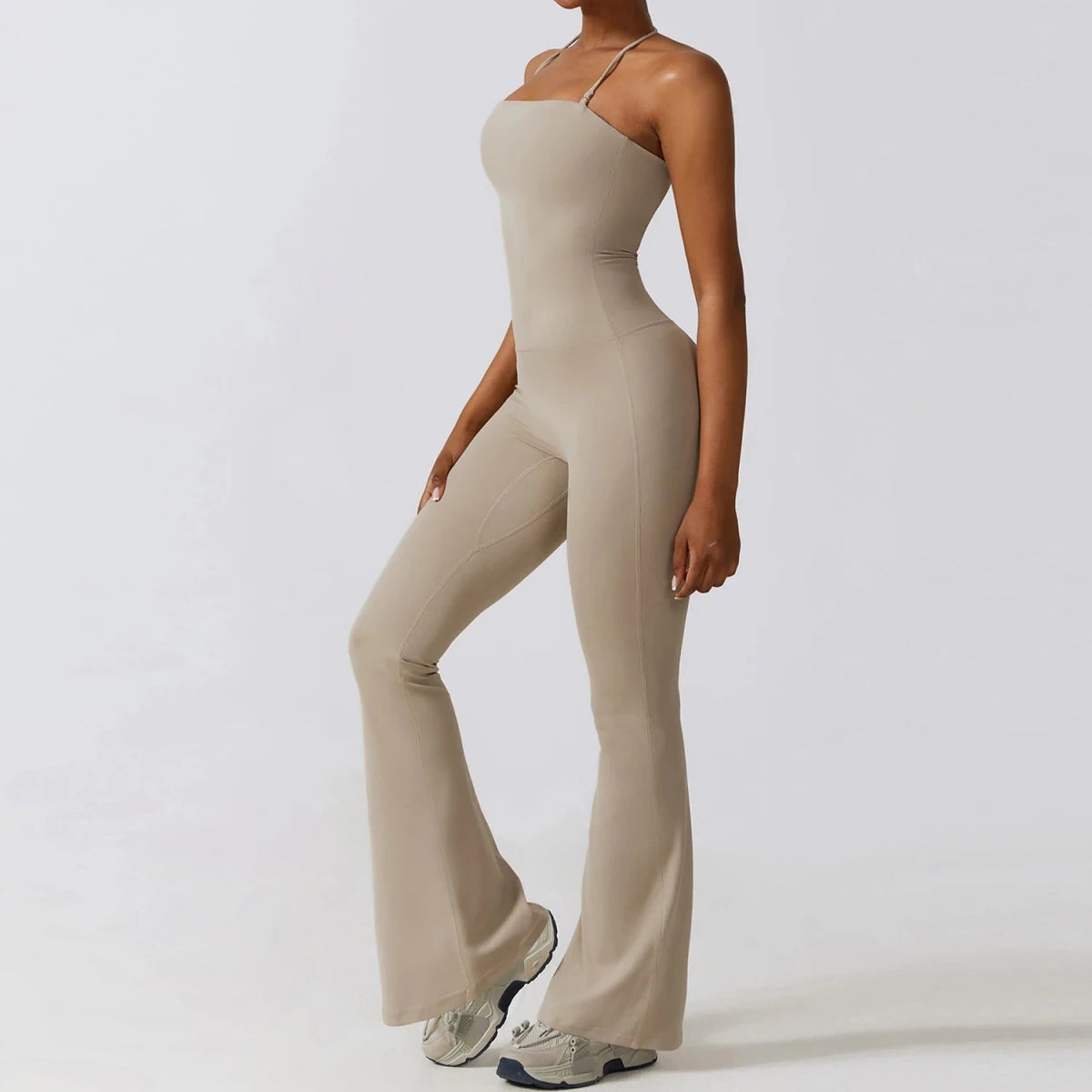 Sand wide leg jumpsuit, side view, fitted waist and flared hem