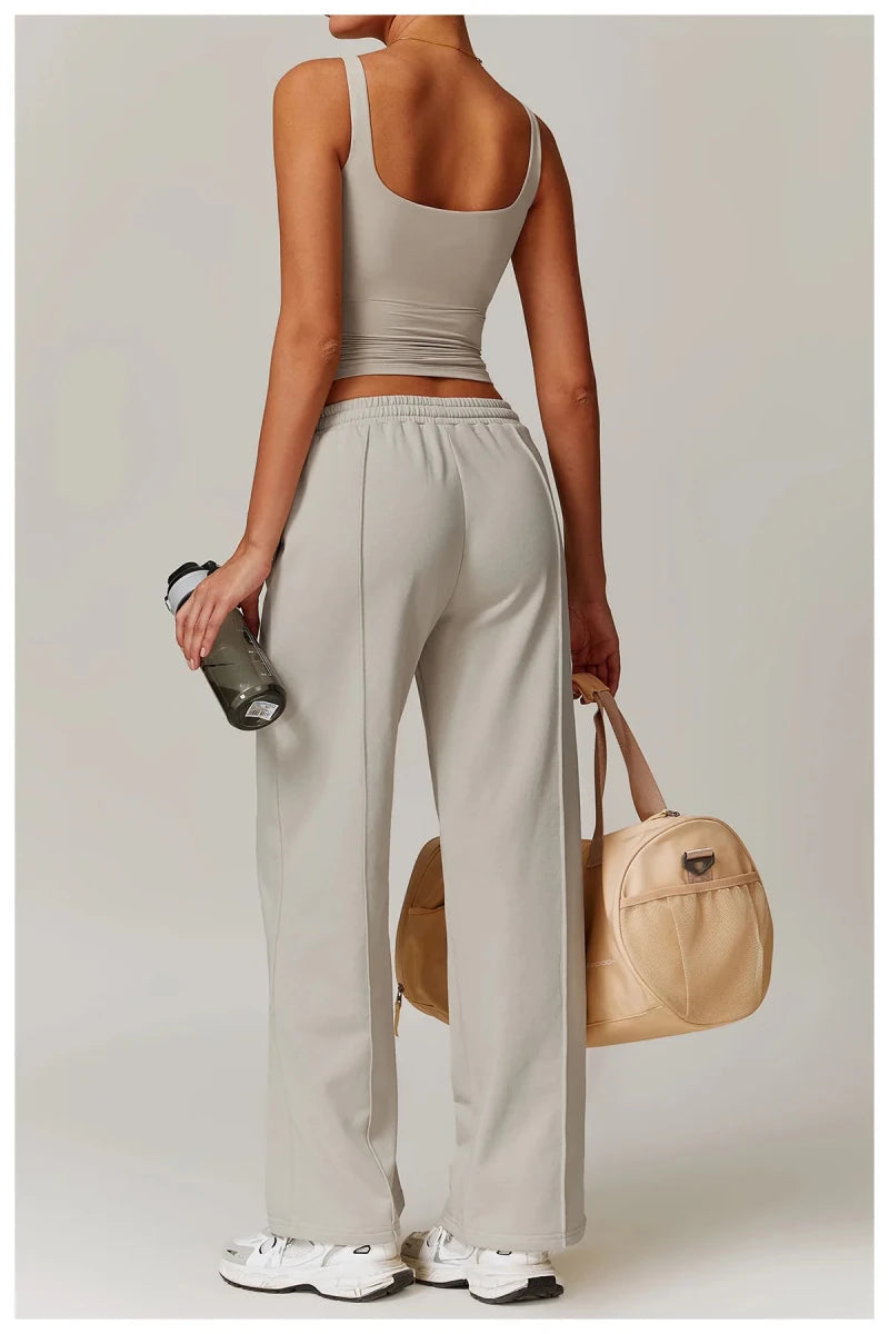 Khaki ribbed tank top with built in bra and square neck, back view with bag