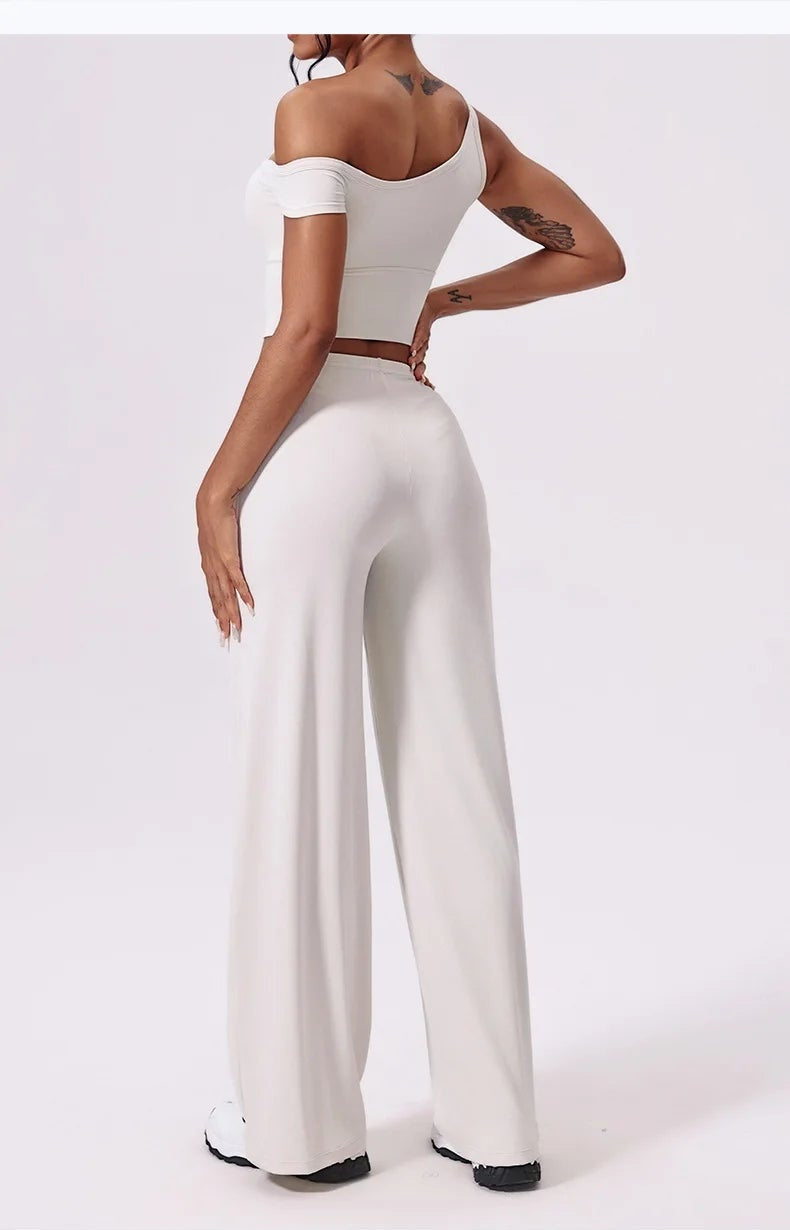 White yoga pants front view, worn with a cropped top