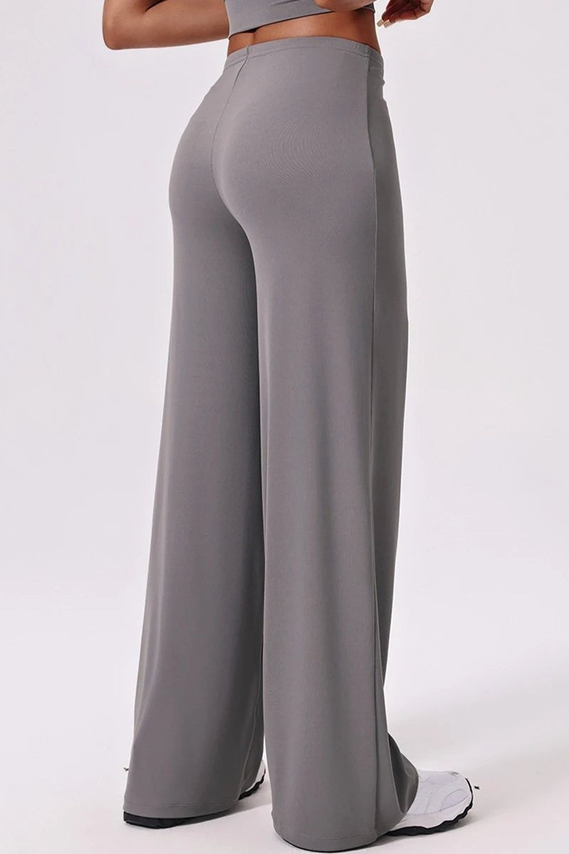 Grey wide leg yoga pants, back view