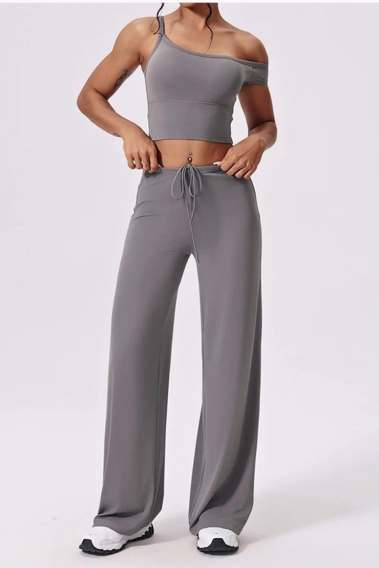 Grey wide leg yoga pants with cropped top, front
