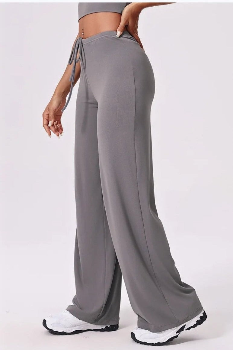 Grey wide leg sweatpants style yoga pants, side view, straight leg