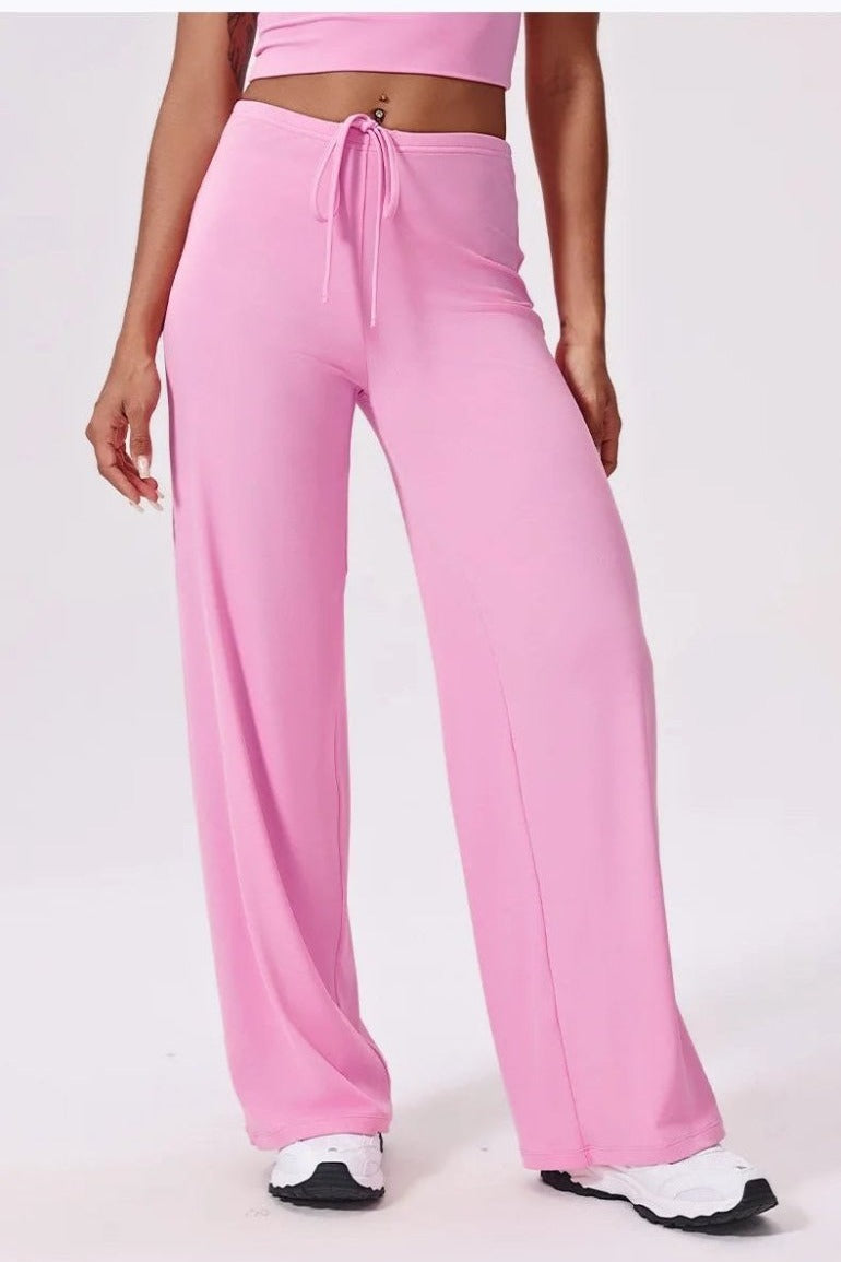 Pink high waisted yoga pants, front, drawstring tied