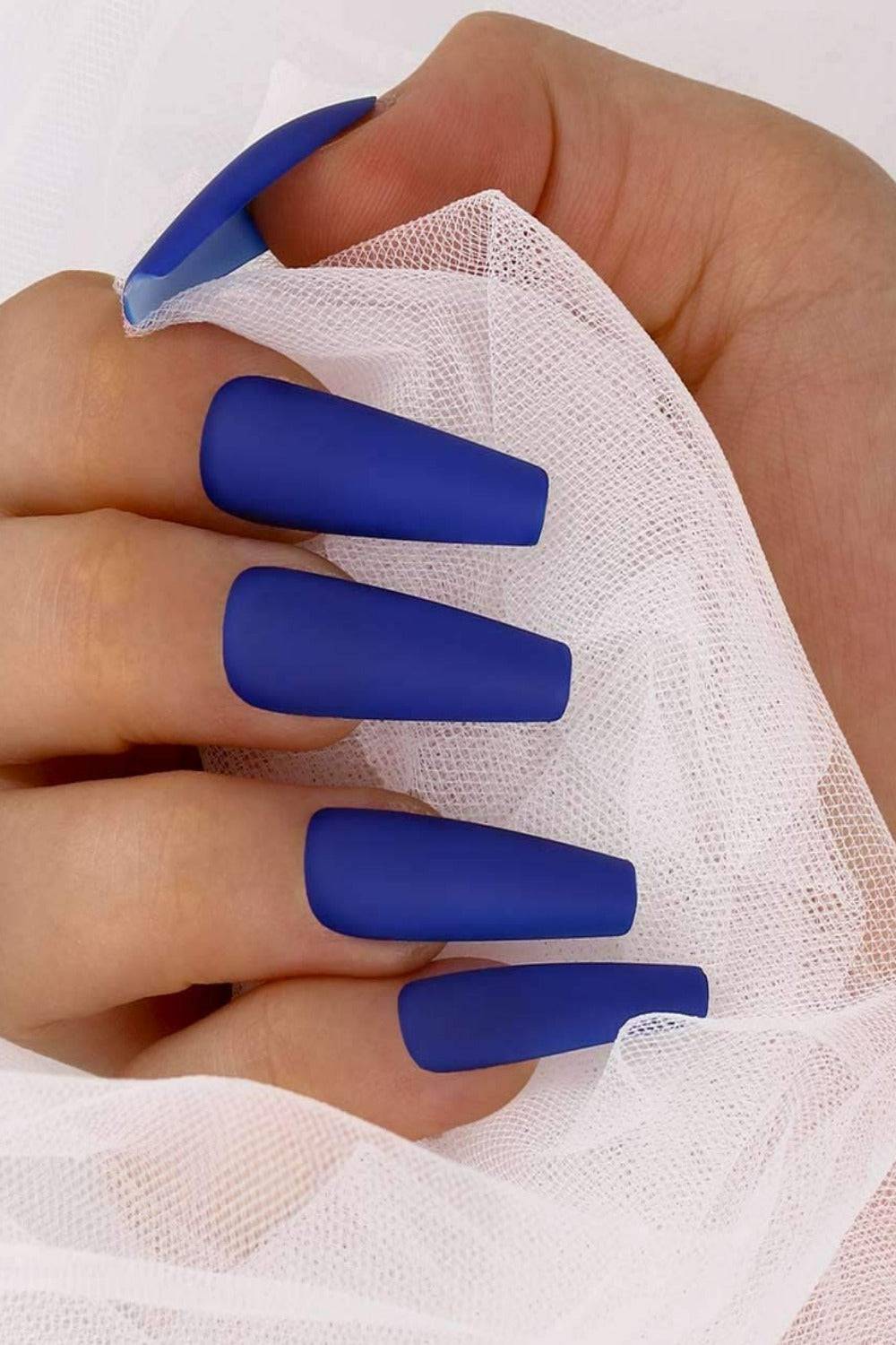 Womens Manicure On Long Round Nails Gel Nail Polish Matte Blue Colour With A  Camouflage Design Of The Eye In The Triangle Matte Finish Blue With A  Design Of The Planet And